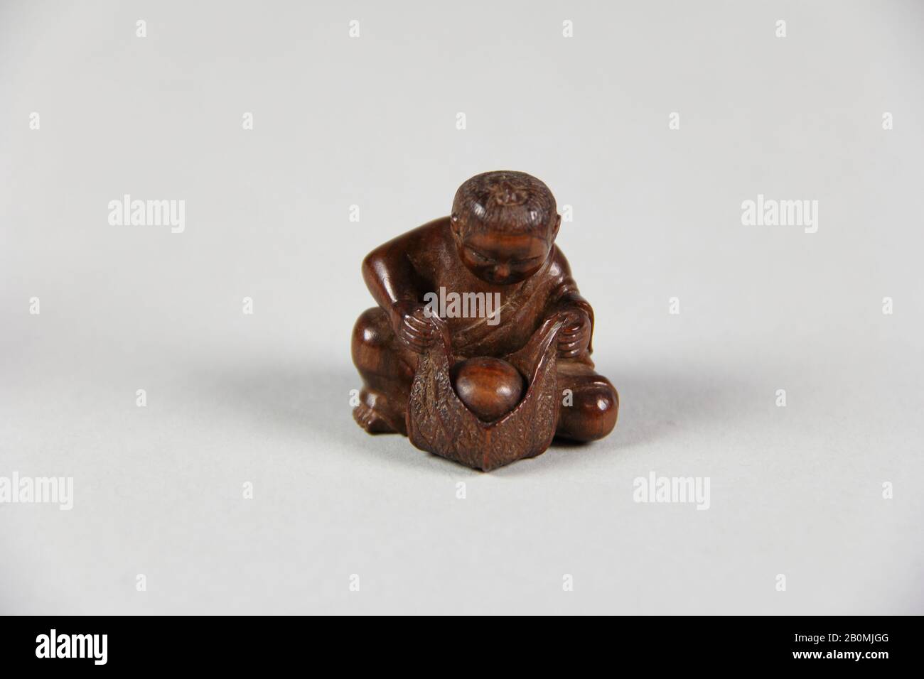 Netsuke, Japon, XIXe siècle, Japon, Wood, H. 1 1/4 po. (3,2 cm), Netsuke Banque D'Images