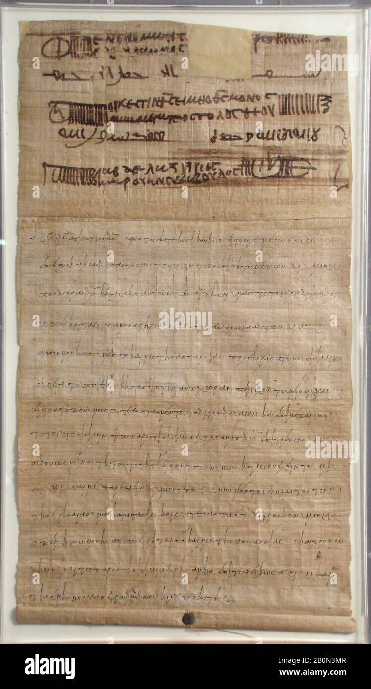 Papyrus, copte, 698, Fabriqué en Egypte byzantine, copte, Papyrus et encre, Dans L'Ensemble: 25 13/16 x 14 3/8 po. (65,5 x 36,5 cm), encadrée : 27 1/2 x 16 1/8 x 1 3/16 po. (69,9 x 40,9 x 3 cm), Papyrus Banque D'Images