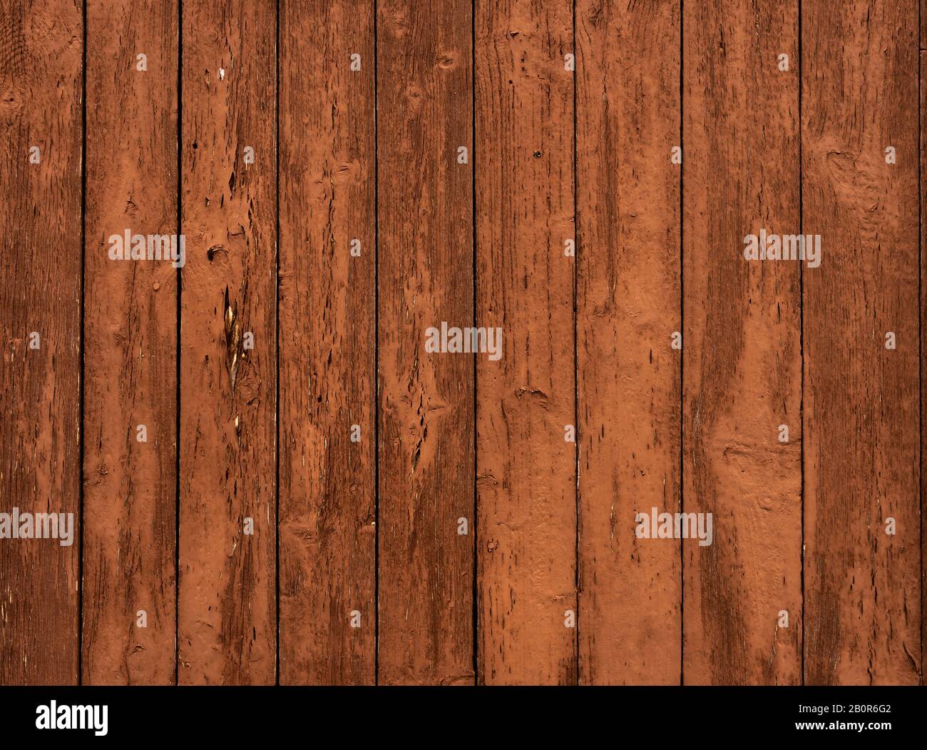 WOM a endommagé la paroi en bois en marron comme fond ou texture Banque D'Images