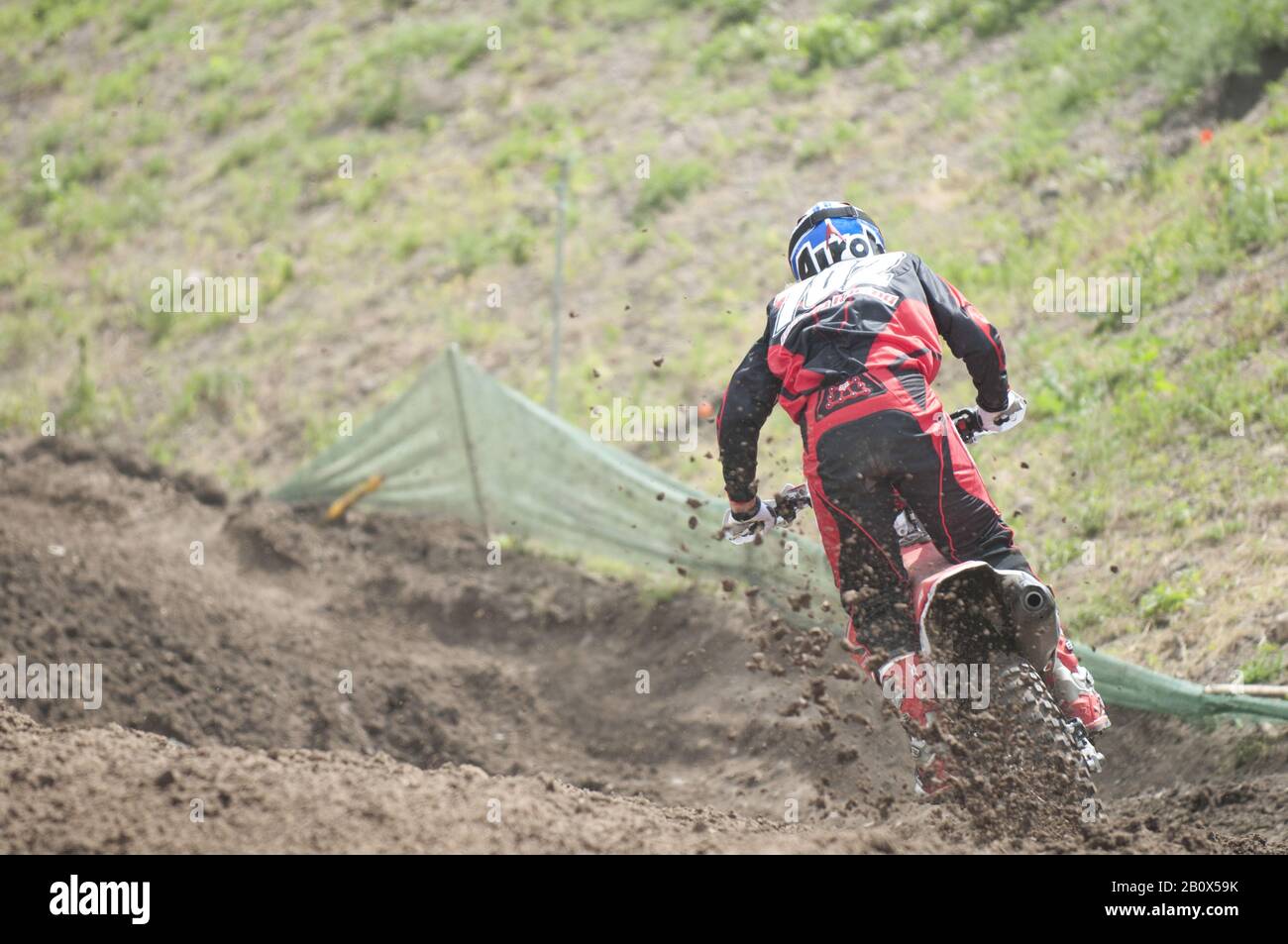 Pilote Motocross sur un circuit de course, Banque D'Images