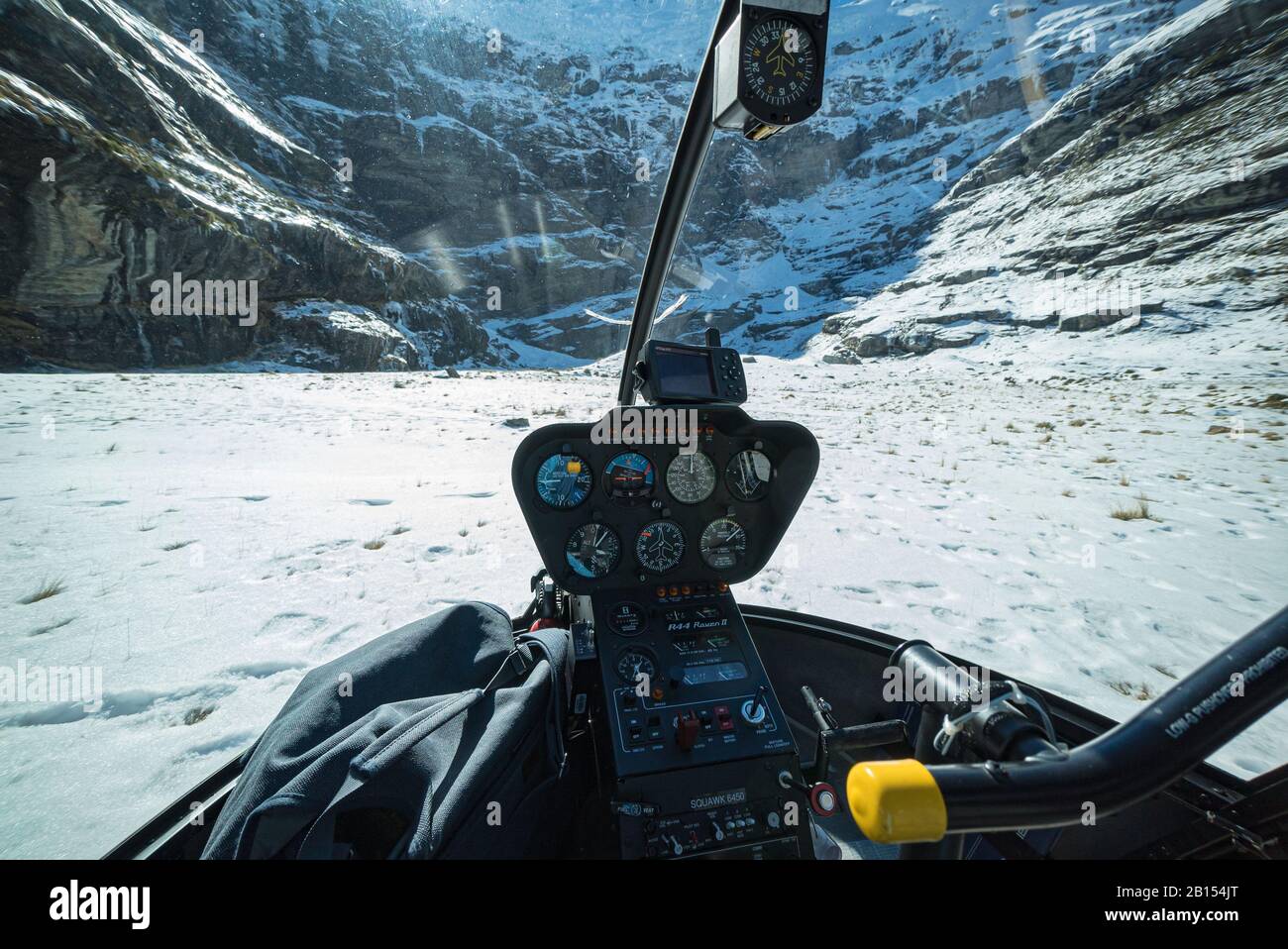 Dans le poste de pilotage d'un hélicoptère Robinson R44 Raven II atterrit sur Earnslaw Burn exploité par Heliworks Queenstown, Nouvelle-Zélande Banque D'Images