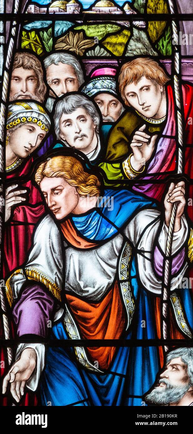 Détail vitrail par Alexander Gibbs c 1895, Jésus cicatrisant l'homme malade, église d'Aldringham, Suffolk, Angleterre, Royaume-Uni Banque D'Images