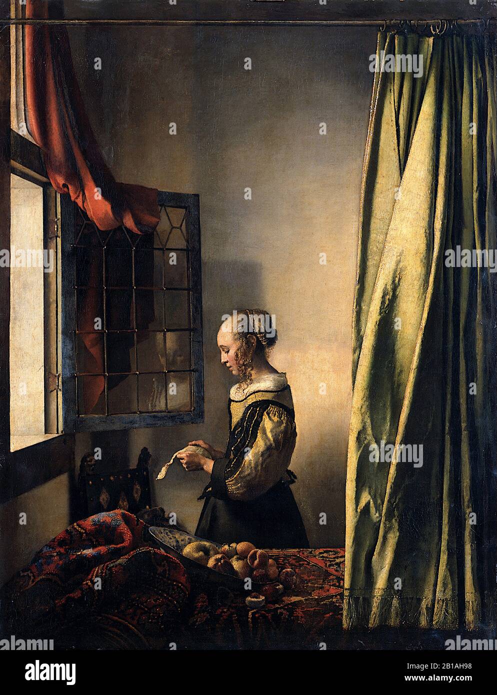 Girl Reading une lettre à une fenêtre ouverte (vers 1658) par Johannes Vermeer - époque baroque néerlandaise du XVIIe siècle Peinture - image Très haute résolution Banque D'Images