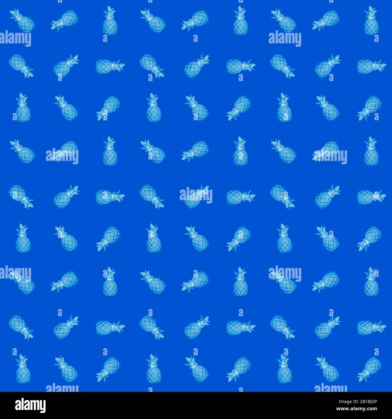 Arrière-plan abstrait transparent des ananas bleus sur un fond bleu. Banque D'Images