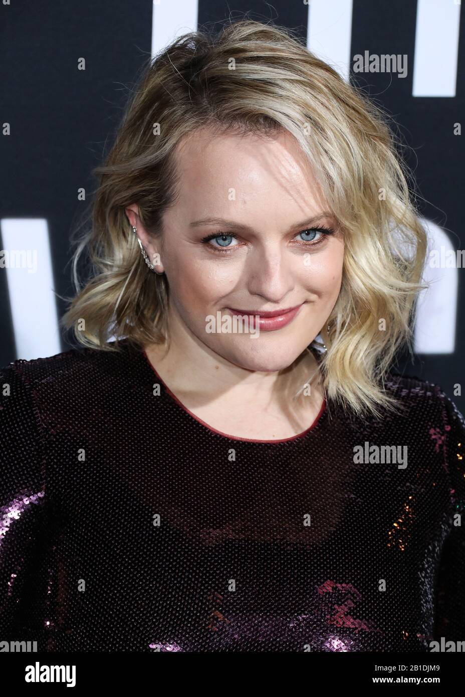 Hollywood, États-Unis. 24 février 2020. HOLLYWOOD, LOS ANGELES, CALIFORNIE, ÉTATS-UNIS - 24 FÉVRIER : L'actrice Elisabeth Moss portant une robe Tom Ford, des chaussures Christian Louboutin, un sac Tyler Ellis avec des bijoux de Djula et Yves Tufenkjian arrive à la première de Los Angeles de Universal Pictures 'The invisible Man' tenue au Théâtre chinois IMAX de TCL le 24 février 2020 à Hollywood, Los Angeles, Californie, États-Unis. (Photo De Xavier Collin/Image Press Agency) Crédit: Image Press Agency/Alay Live News Banque D'Images