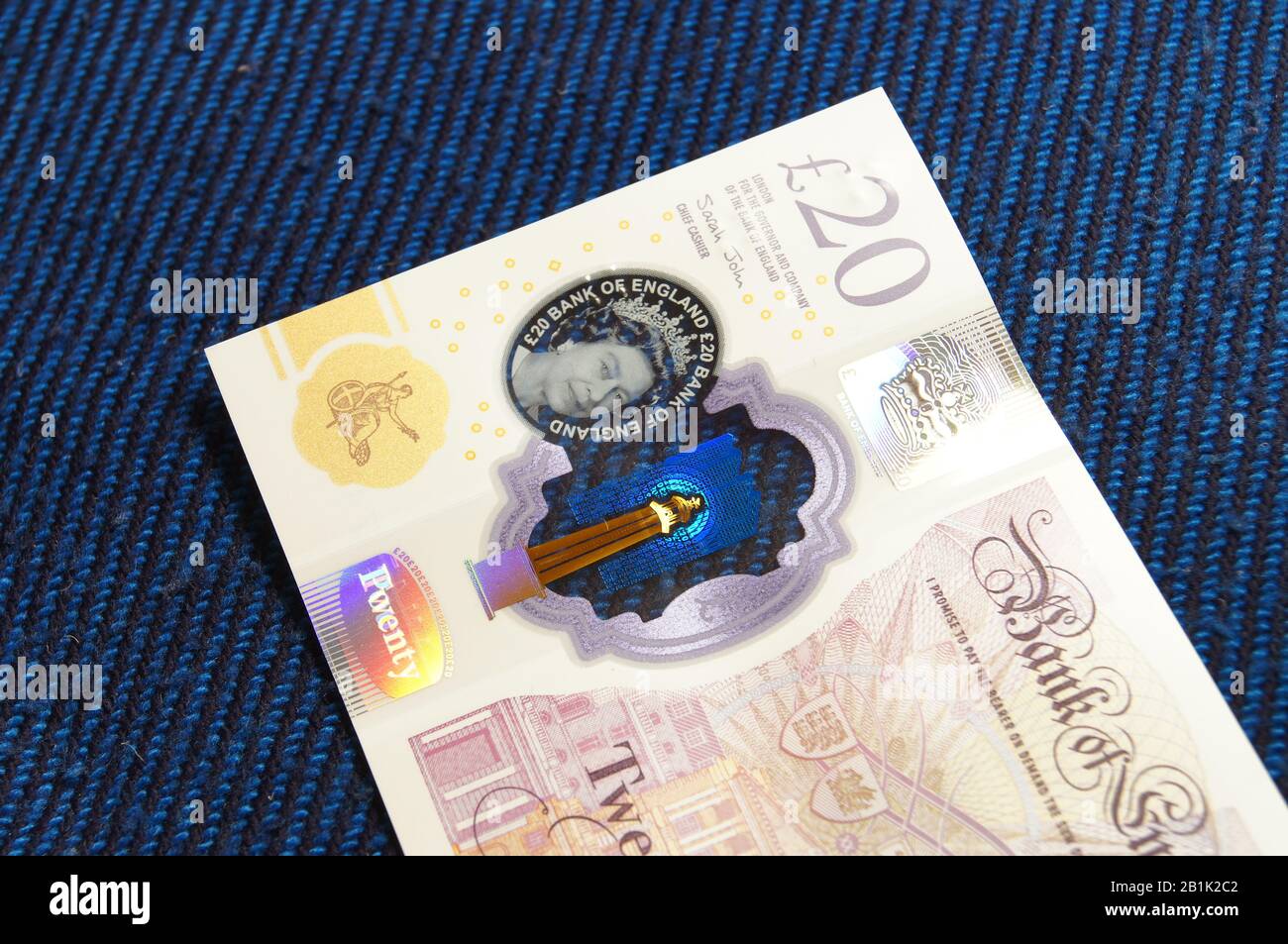 Billet polymère £20 avec numéros de série séquentiels Banque D'Images