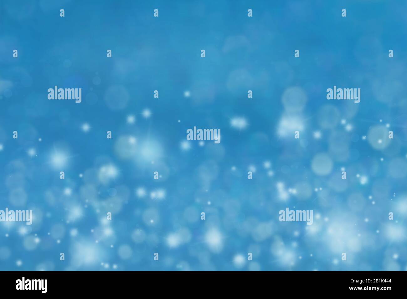 Noël bleu et blanc étoiles bokeh fond Banque D'Images