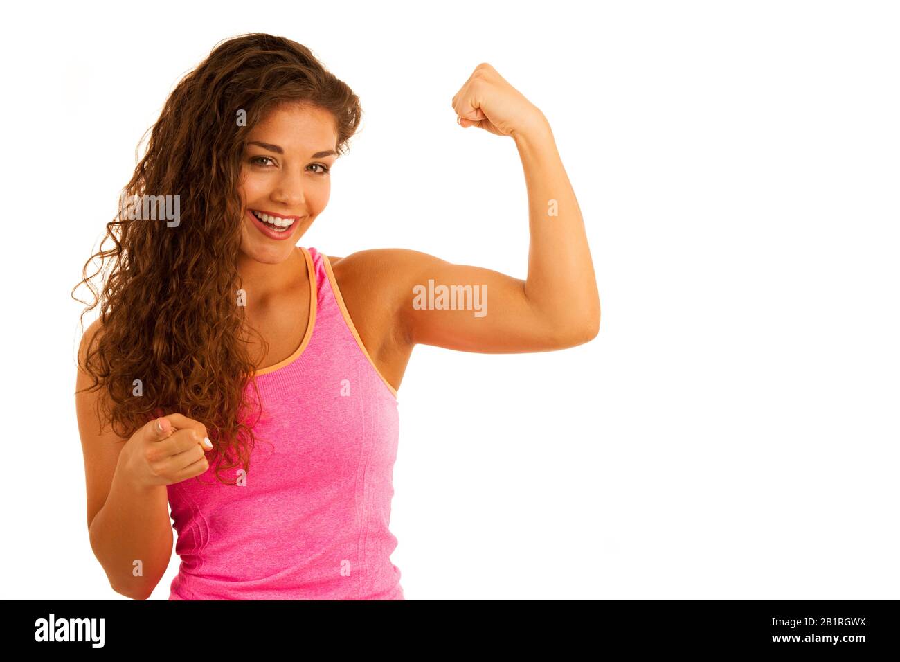Active jeune tenue sportive femme gestuelle puissance avec ses bras isolés sur blanc Banque D'Images