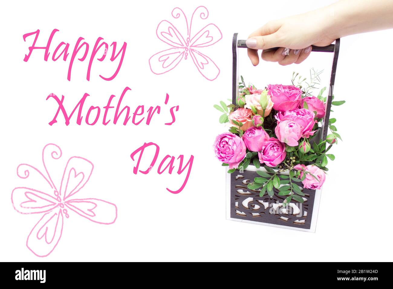 Un bouquet de fleurs dans une boîte cadeau, Booker de roses pour la fête des mères. Roses dans une boîte cadeau. Fleurs le 8 mars. Bonne journée pour les femmes. Bouquet pour un bi Banque D'Images