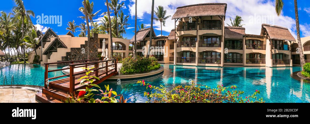 Vacances tropicales dans un complexe de luxe, Belle Mare, île Maurice. Banque D'Images