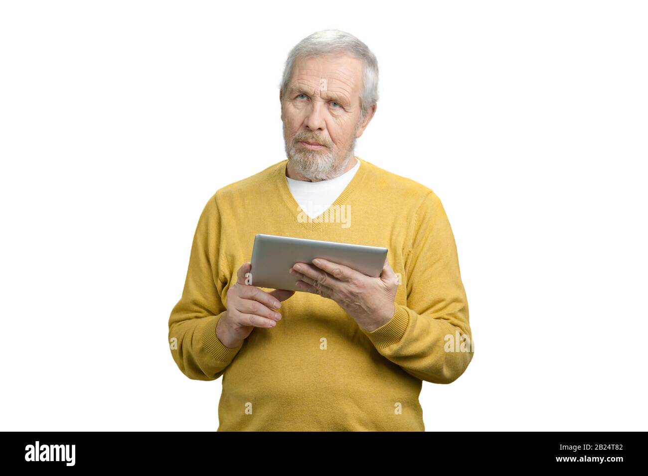Grand-père avec tablette. Banque D'Images