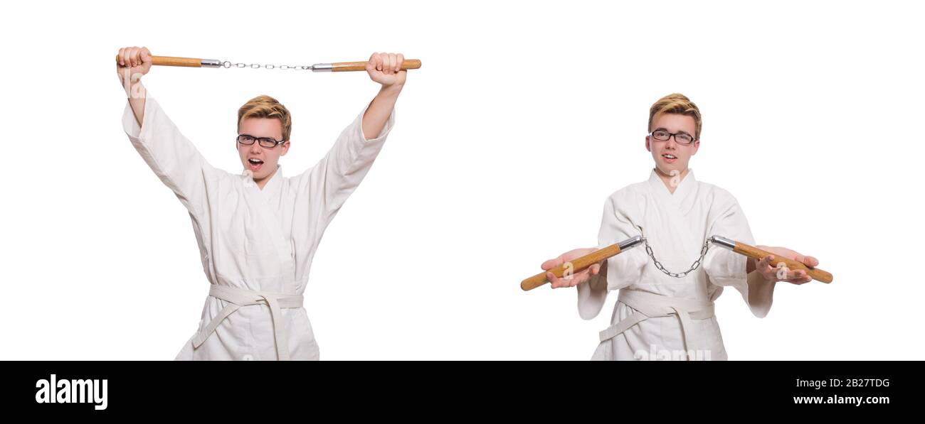Le funny karate fighter avec nunchucks on white Banque D'Images