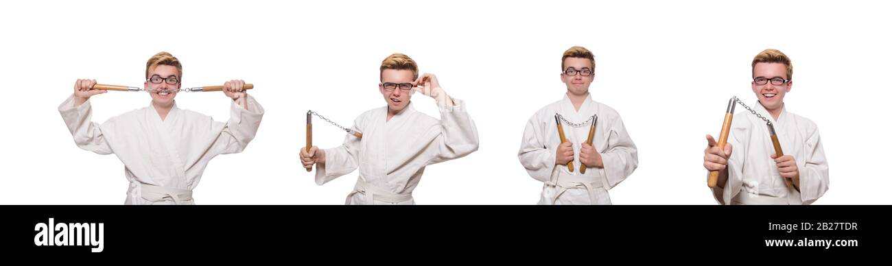 Le funny karate fighter avec nunchucks on white Banque D'Images