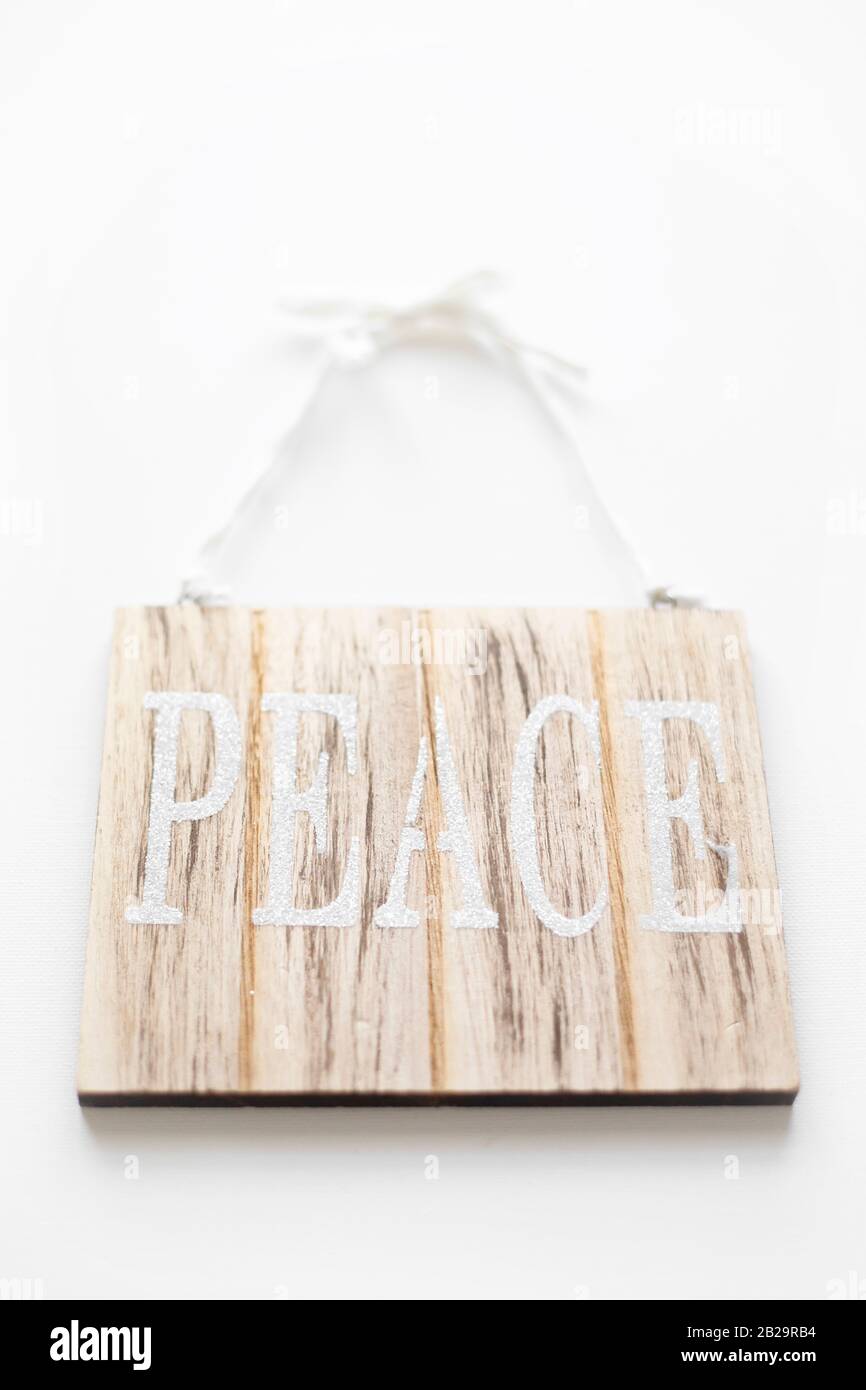 Signe de paix sur fond blanc. Banque D'Images