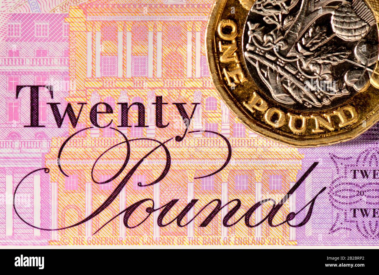 Nouveau billet de 20 £ en polymère britannique (février 2020) et pièce de monnaie en livre Banque D'Images