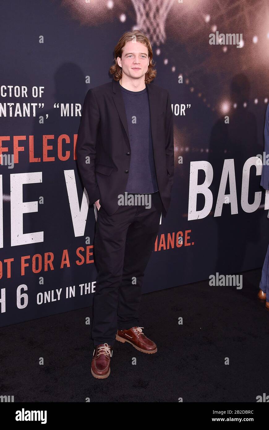 Los ANGELES, CA - MARS 01: Benjamin Irving assiste à la première de Warner Bros Pictures ' Le Retour ' à Regal LA Live le 01 mars 2020 à Los Angeles, Californie. Banque D'Images