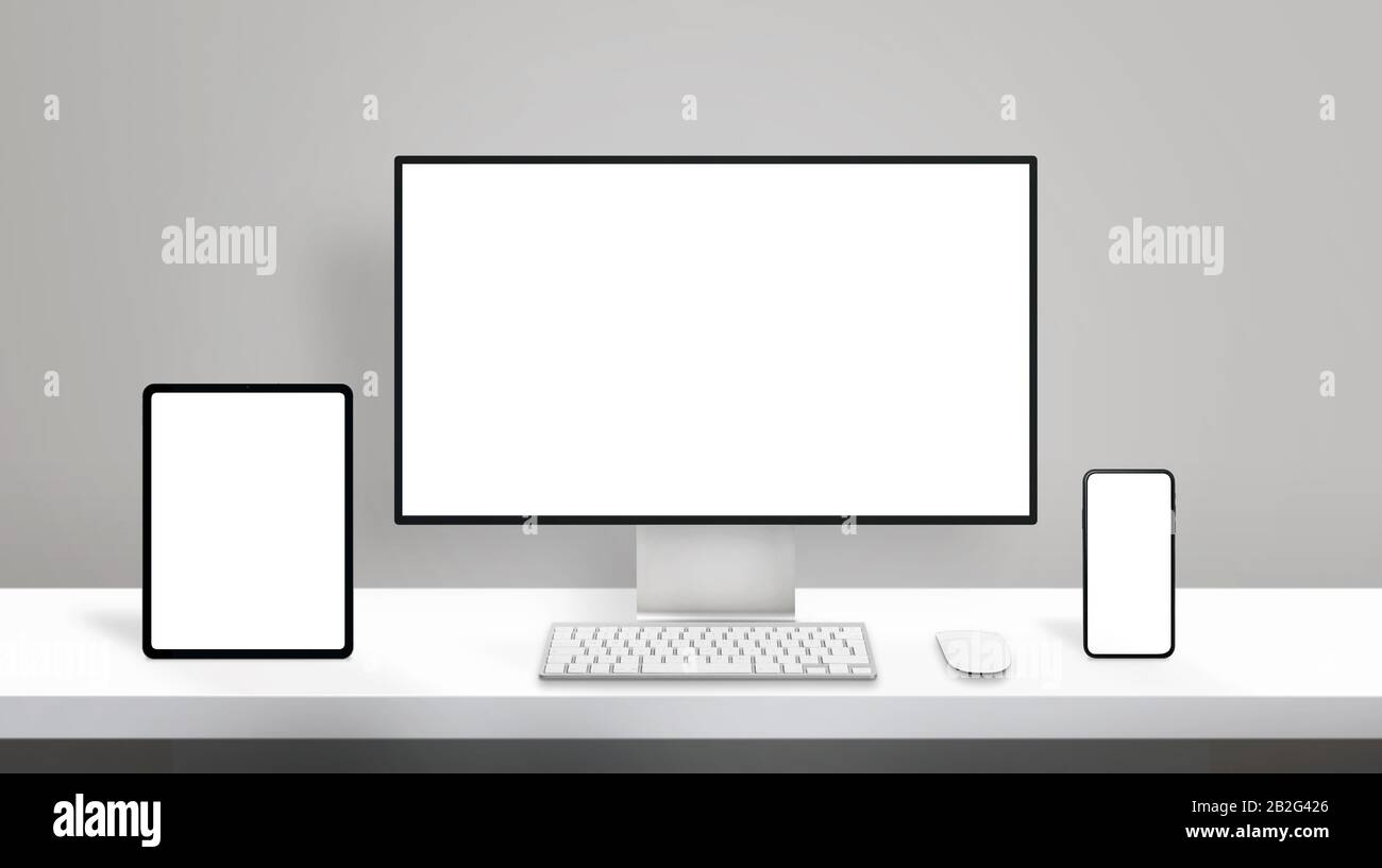 Conception réactive sur différents appareils d'affichage modernes. Écran d'ordinateur, tablette et smartphone sur un bureau propre Banque D'Images