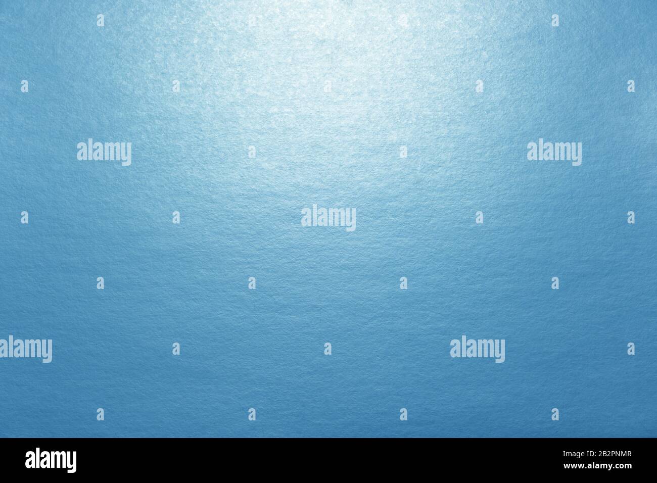 Fond bleu, texture en carton avec éclairage Banque D'Images