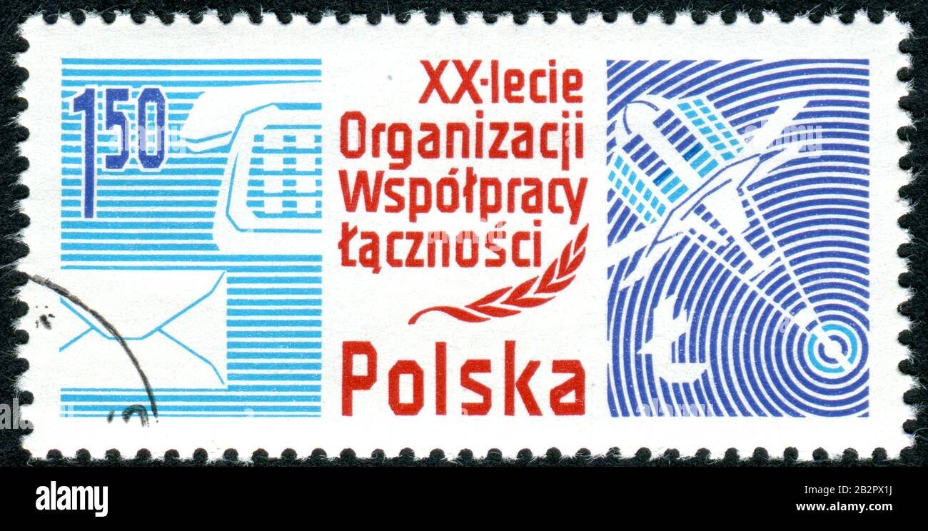 Un cachet imprimé en Pologne, dédié à la 20ème anniv. De l'Organisation des Ministres des postes et télécommunications des pays du Pacte de Varsovie. Banque D'Images