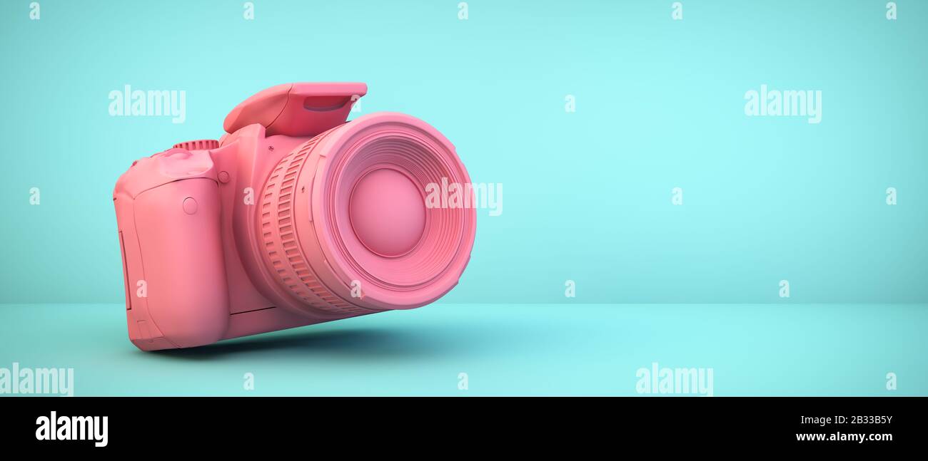 caméra rose sur fond bleu Banque D'Images