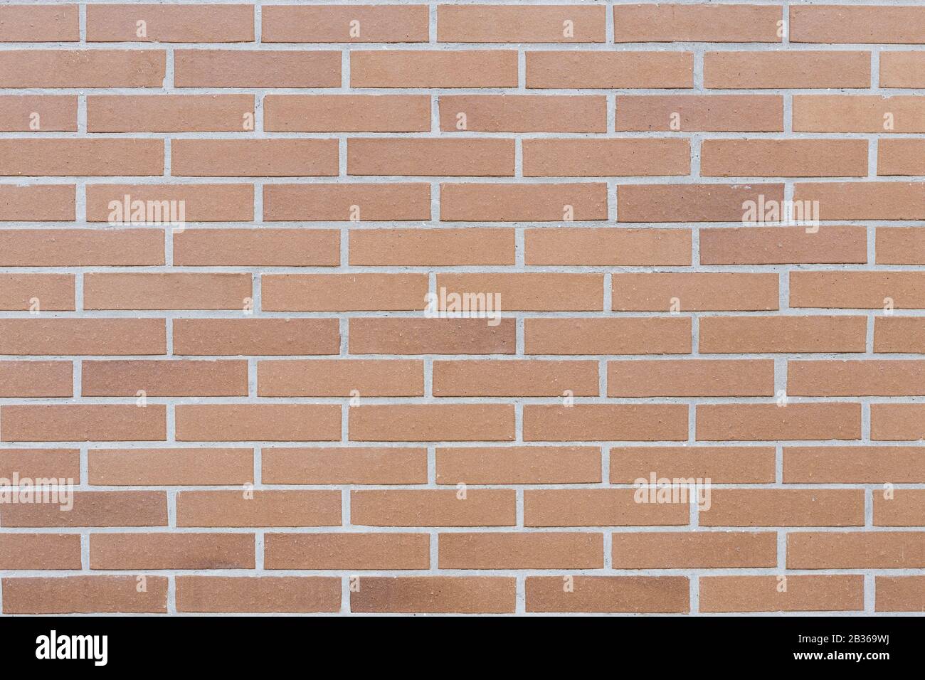 Un mur de briques en céramique marron en position horizontale, pour le fond ou la ressource de matériaux de construction Banque D'Images