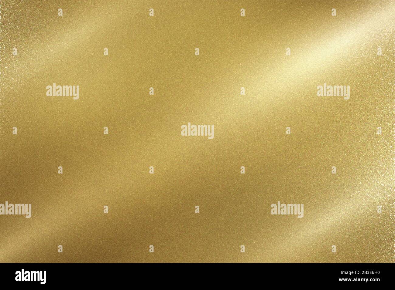 Lumière qui brille sur le mur de métal en feuille d'or avec espace de copie, fond de papier peint Banque D'Images