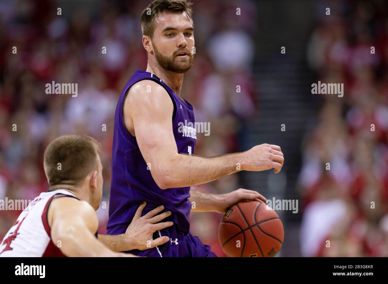 Madison, WI, États-Unis. 4 mars 2020. Garde des Wildcats du nord-ouest Pat Spencer #12 en action pendant le match de basket-ball de la NCAA entre les Wildcats du nord-ouest et les Badgers du Wisconsin au Kohl Center à Madison, WI. John Fisher/Csm/Alay Live News Banque D'Images