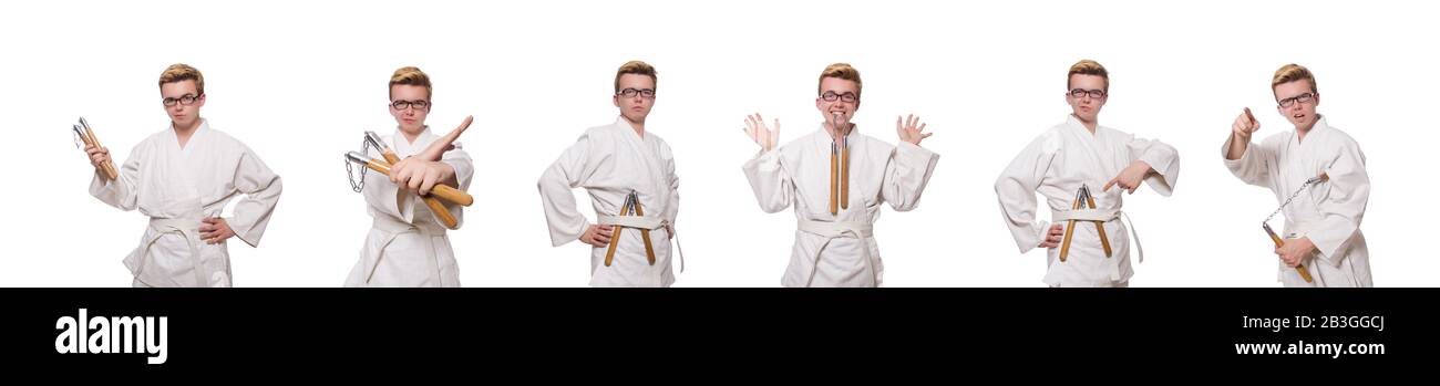 Le funny karate fighter avec nunchucks on white Banque D'Images