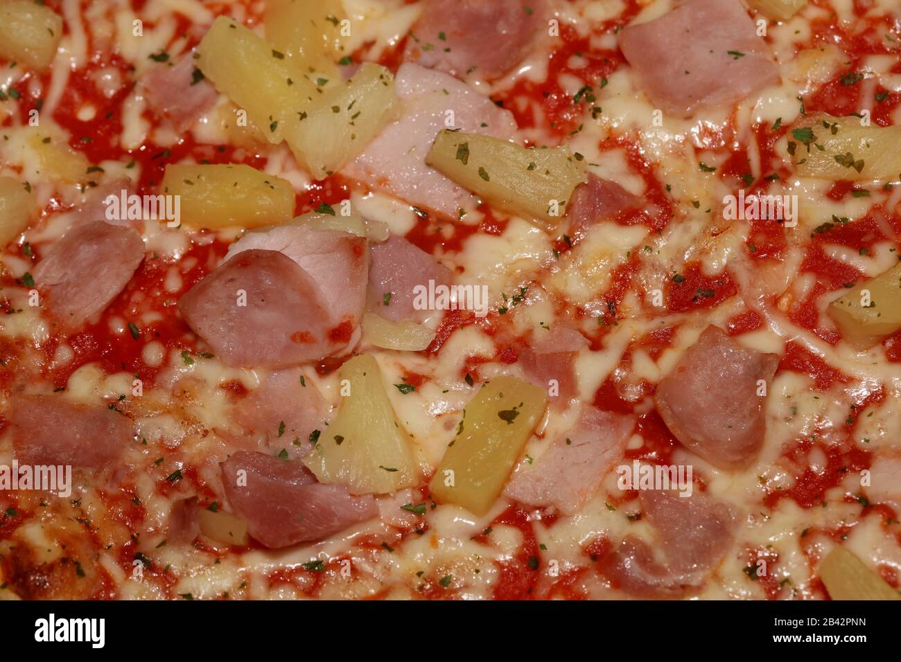 pizza hawaïenne cuite au four macro fond photographie haute qualité Banque D'Images