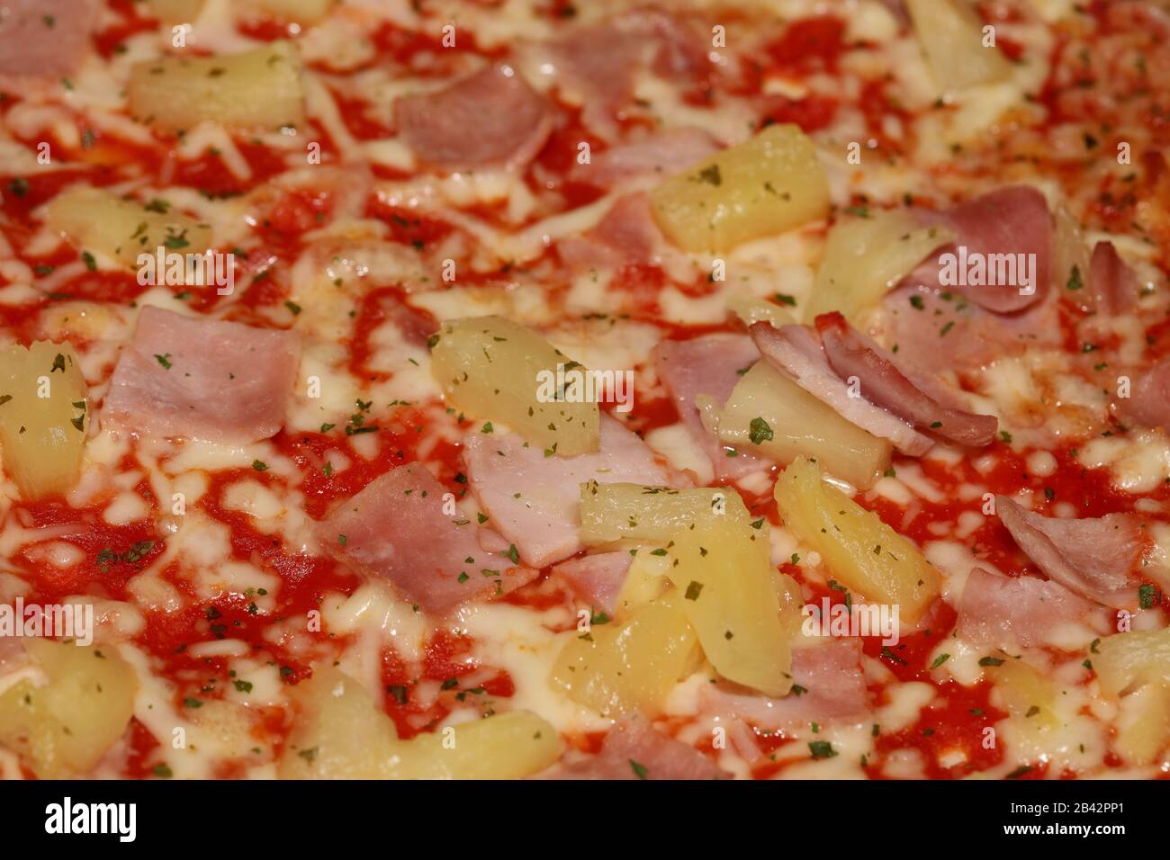 pizza hawaïenne cuite au four macro fond photographie haute qualité Banque D'Images