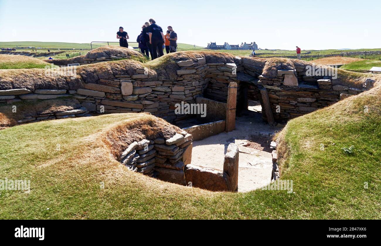 Royaume-Uni, Écosse, Orkney Islands est un archipel dans les îles du Nord de l'Ecosse, , l'océan Atlantique, Skara Brae, un établissement néolithique situé dans l'Orkney Mainland. Dans ce village préhistorique, l'un des groupes les mieux préservés de maisons préhistoriques en Europe occidentale, les gens peuvent voir le mode de vie de 5 000 ans auparavant, avant la construction de Stonehenge. Banque D'Images