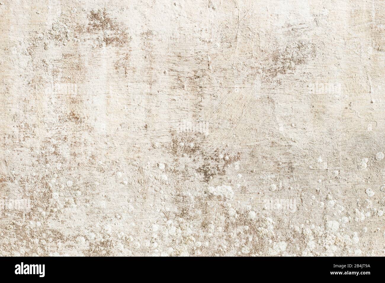 vieux mur blanc taché par le passage du temps Banque D'Images