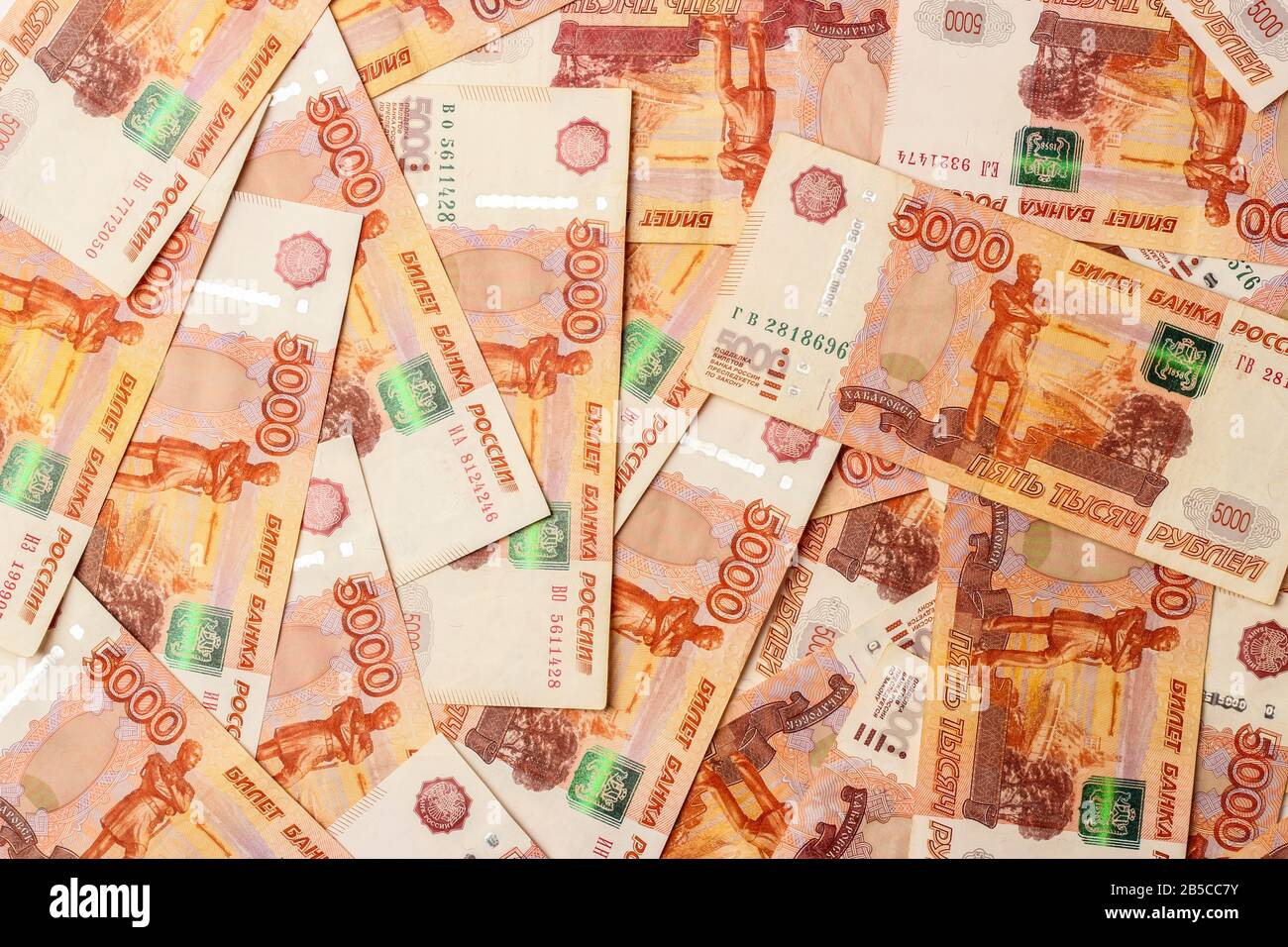 Cinq millièmes billets russes en arrière-plan Banque D'Images