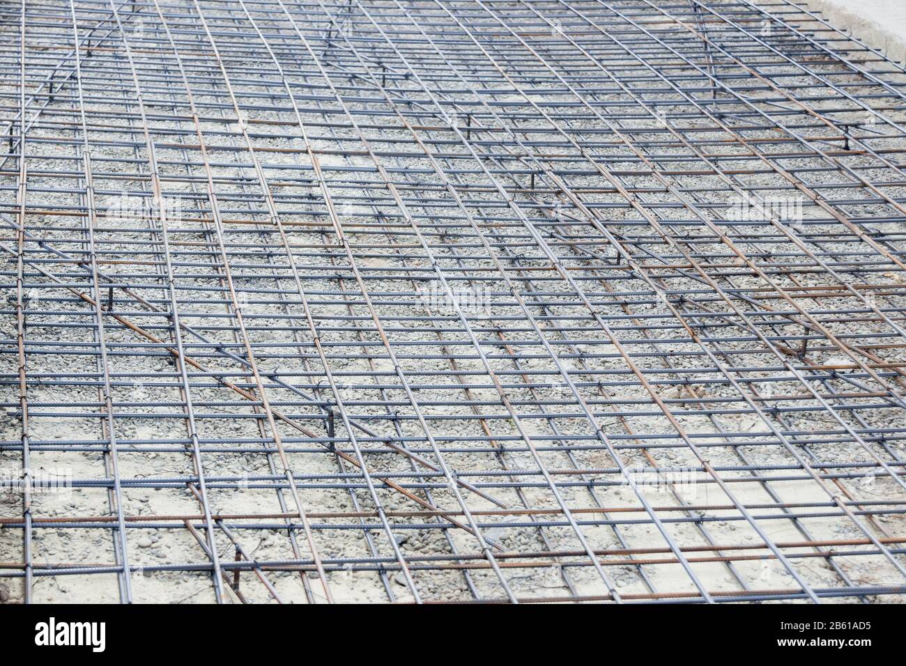 Arrière-plan des barres d'acier de renfort pour l'armature de bâtiment. Renforcement en acier dans la construction du bâtiment. Banque D'Images