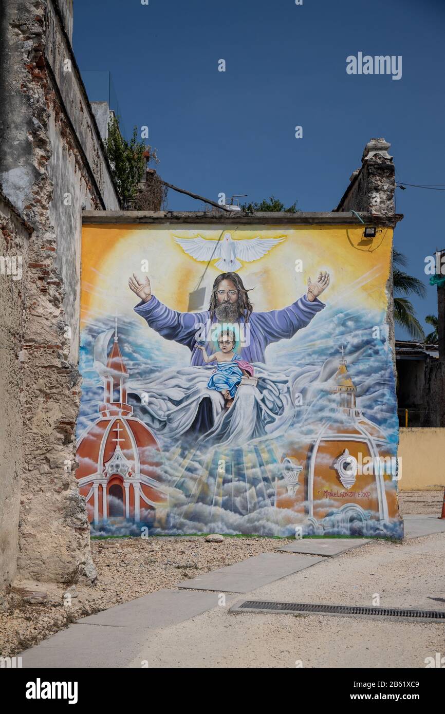 L'entrée du parking principal de Getsemani sur la Calle 29. Une murale de Jésus-Christ vous accueille au parqueadero, Banque D'Images