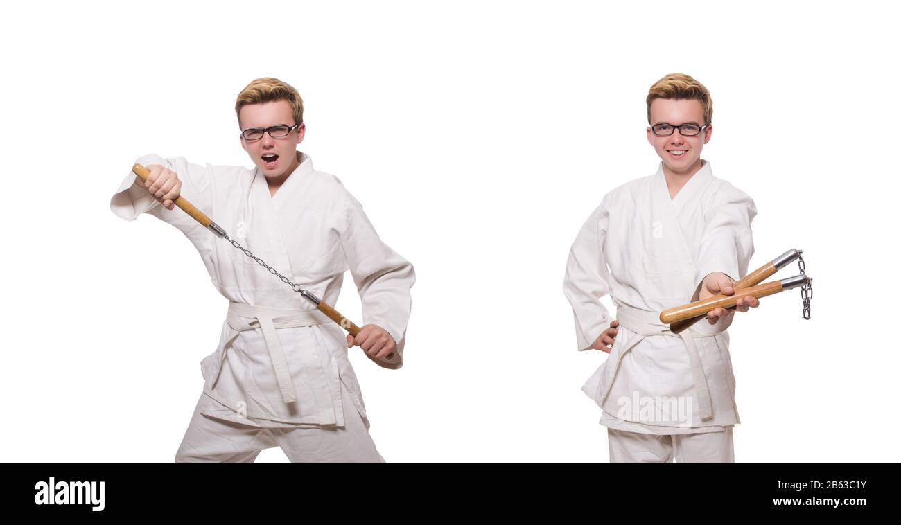 Le funny karate fighter avec nunchucks on white Banque D'Images