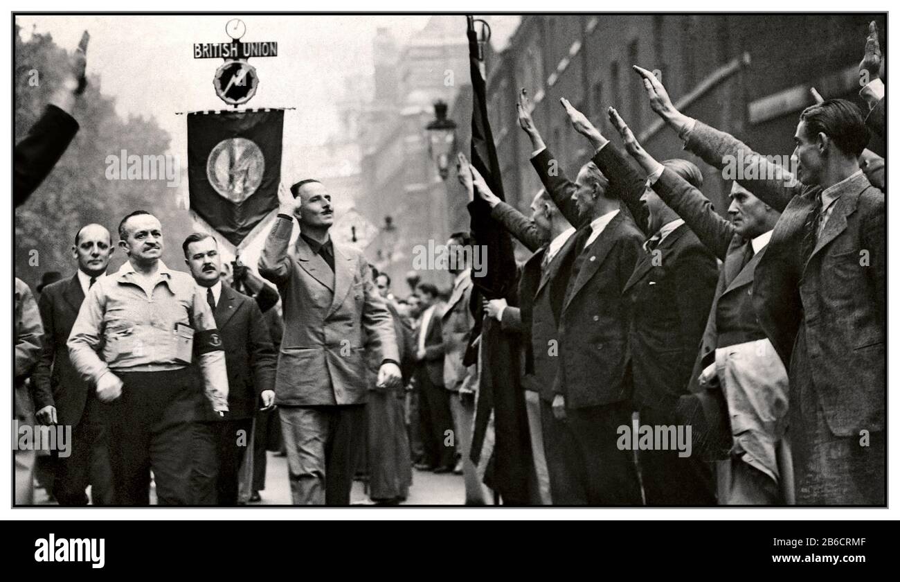 Oswald MOSLEY BUF PARTY 1930 Grande-Bretagne Oswald Mosley, leader de "l'Union britannique des fascistes", salue de manière extrême droite le type nazi des partisans lors d'un rassemblement de facistes à Londres 1937 à la tête de l'Union britannique des fascistes Banque D'Images