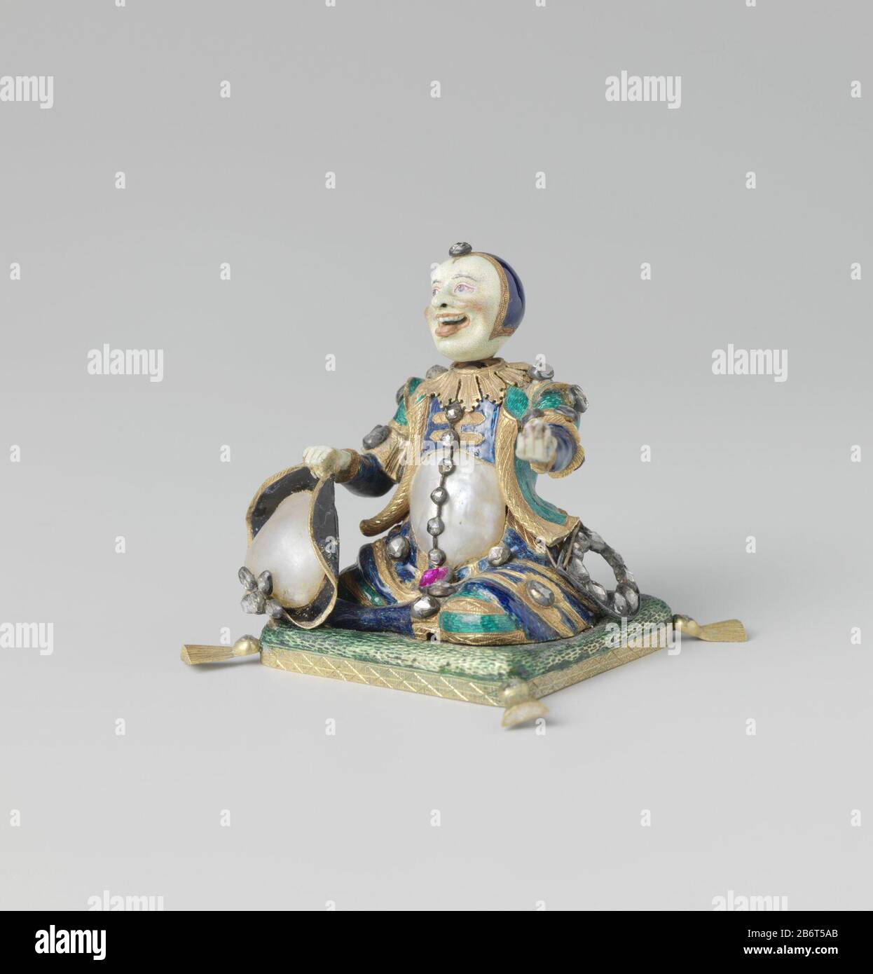 Harlekijn Beeld van goud a rencontré e-mail, barok-parels en edelstenen, voorstellende een harlekijn a rencontré een beweegbaar hoofd. A zijn rechtermain heeft hij een hoed, in de linker een spiegel. Fabricant : edelsmid: Anoniemedelsmid: Kohler (verworpen toeschrij)Plaats fabriquent: Edelsmid: Frankfurt am Main (mogelijk)edelsmid: Dresden Dating: Voor 1725 Physical kenmerken: Gedeeltelijk geëmailleerd goud, paen edsteneden matériel: 5 cm-fleerd: Ebelleiten: Banque D'Images