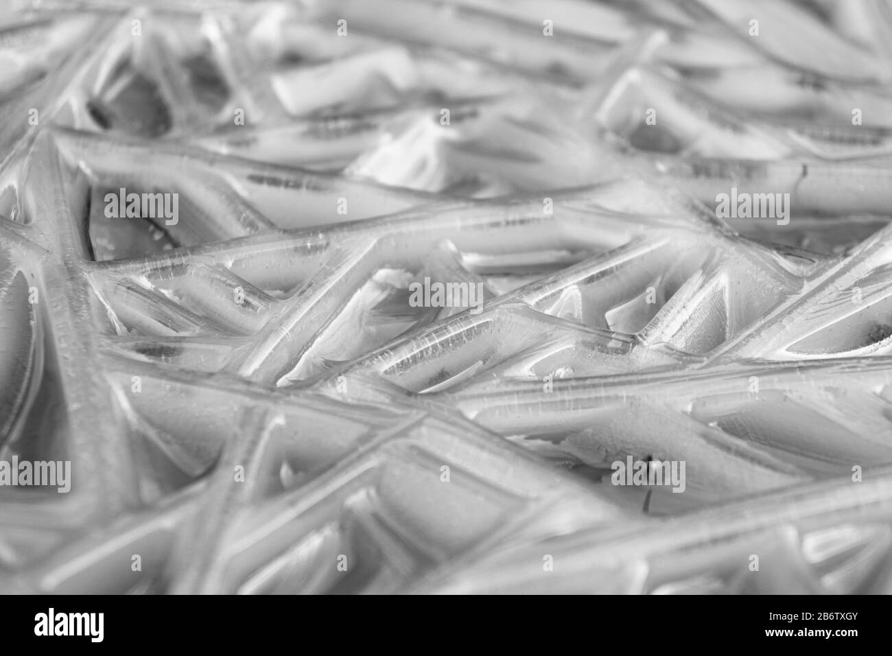 Texture de la surface de glace. Fond de la texture de la glace et de la neige. Surface de glace rayée abstraite. Eau gelée fond d'hiver. Banque D'Images