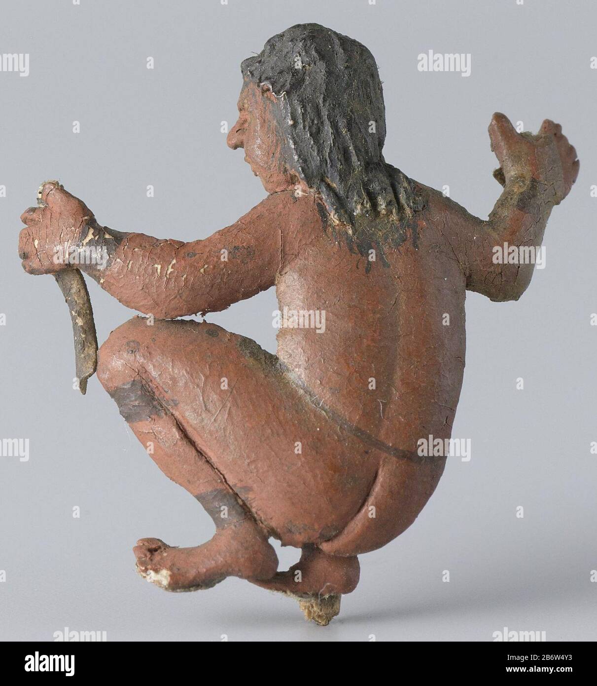 Une figure lâche sur un diorama de Gerrit Schouten, représentant un rouching ou Karaïb Arobak, a tourné à gauche. Son bras droit levé. Dans sa main gauche, a mes. Fabricant : fabricant: Gerrit Schouten Lieu de fabrication: Suriname Dating: CA. 1810 - avant ou à l'intérieur 1839 matériau: Colle papier peinture technique: Modélisation / dimensions du peintre: H 2.6 cm. × l 2,6 cm. L'explication peut venir d'un diorama avec un Caraibenkamp. Objet: Peuples autochtones d'Amérique du Sud Quand: 1800 - 1839 Banque D'Images