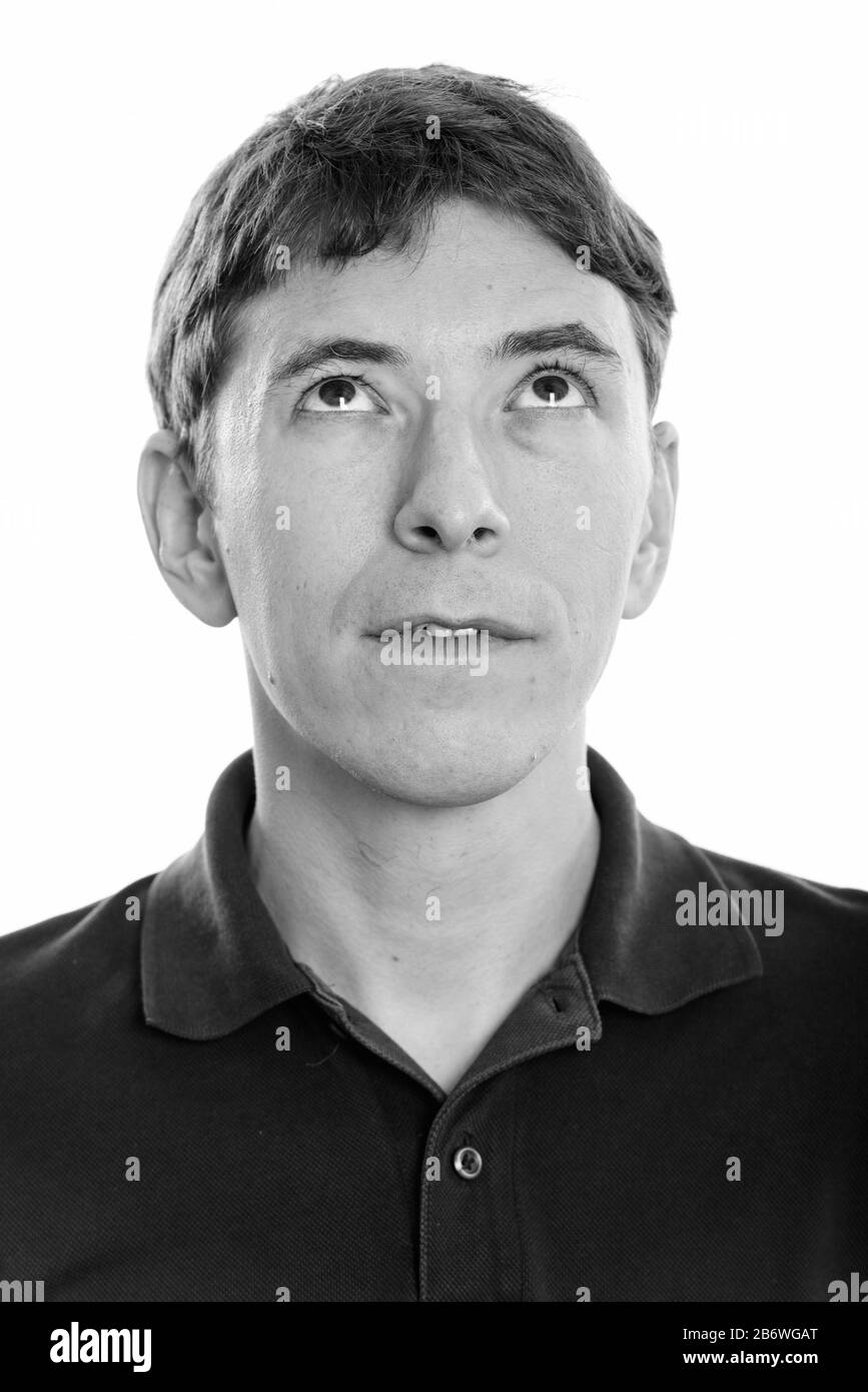 Visage de l'homme pensant, tout en regardant vers le haut Banque D'Images