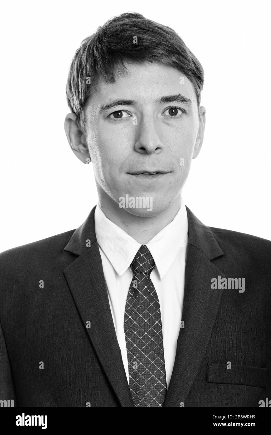 Le visage d'un homme d'affaires en costume regardant l'appareil photo Banque D'Images