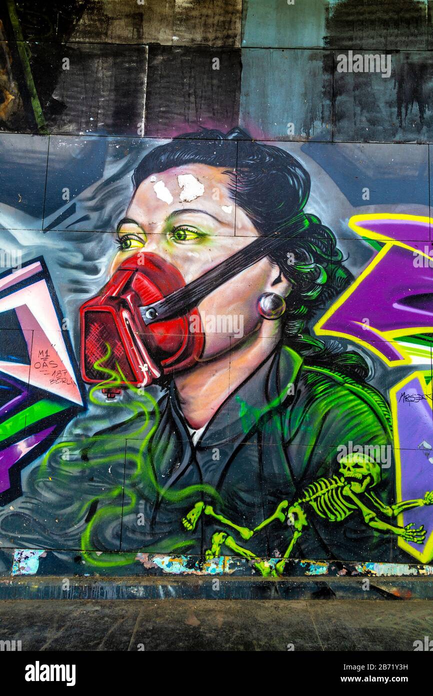 Murale de femme portant un masque facial à Séville, Andalousie, Espagne Banque D'Images