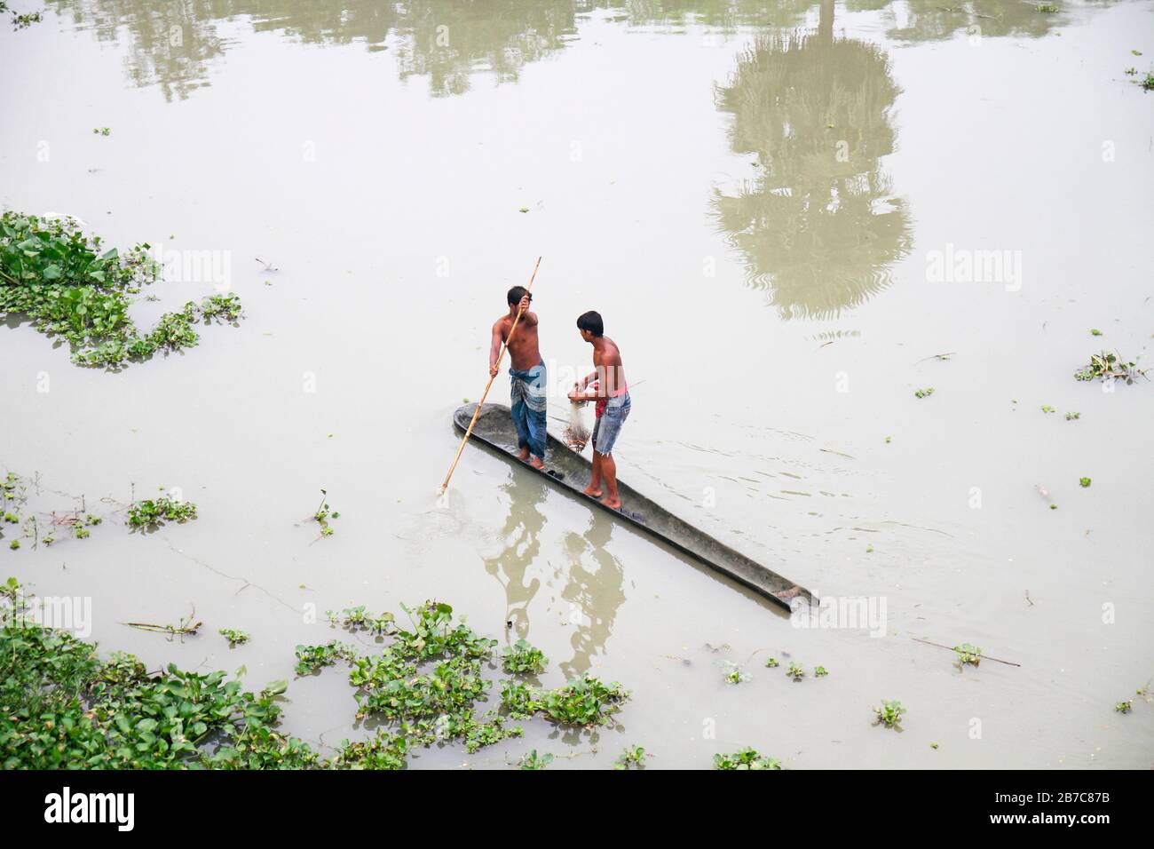 Le Bangladesh est l'un des pays les plus vulnérables aux changements climatiques. Les inondations sont ici la principale calamité naturelle pour les populations rurales pauvres Banque D'Images