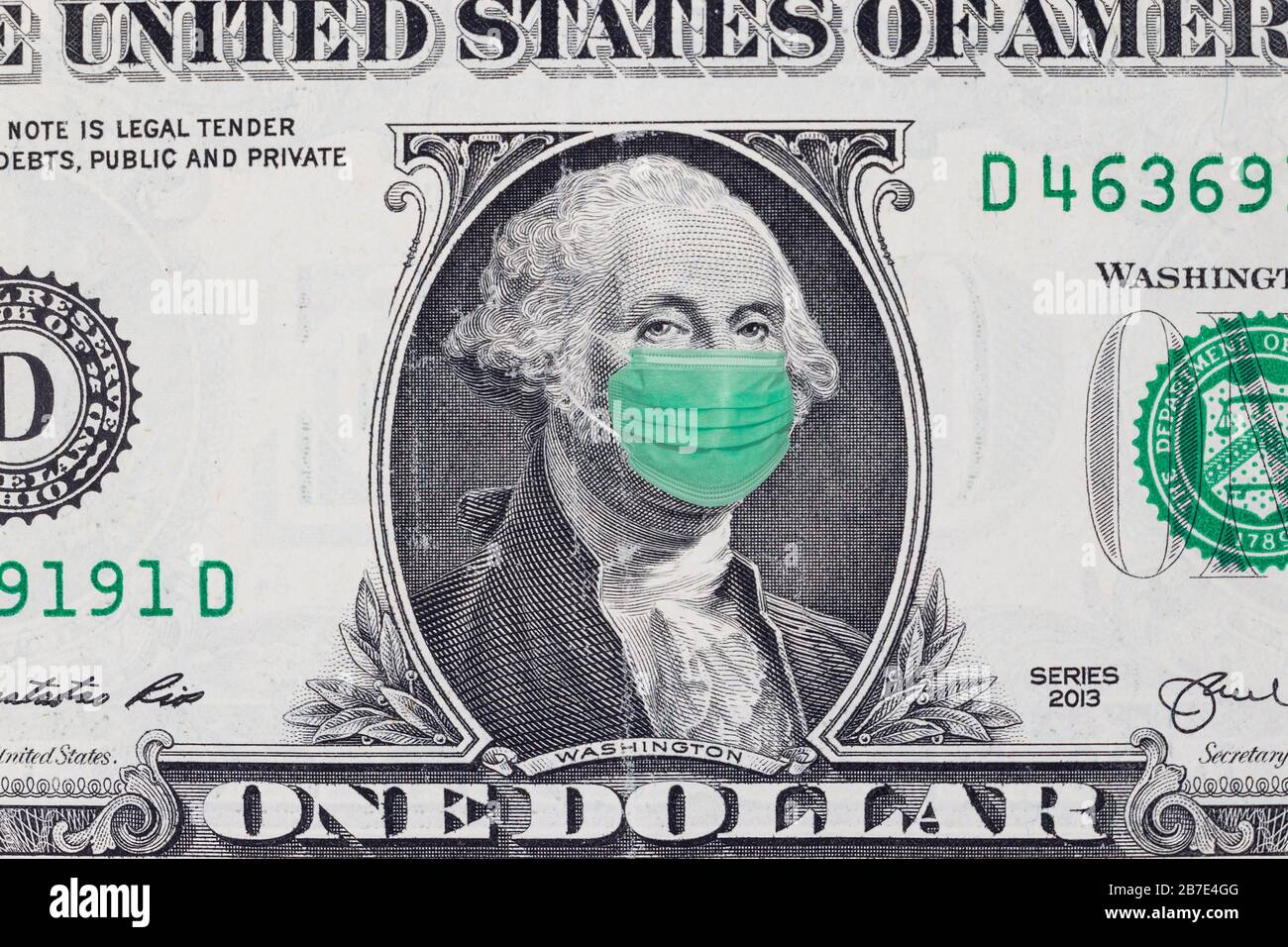 Un dollar avec masque facial médical sur George Washington Banque D'Images
