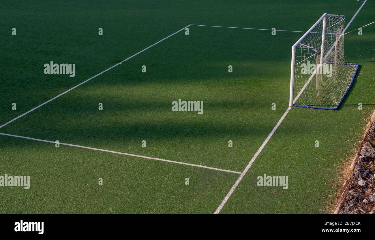 terrain de football avec herbe synthétique Banque D'Images