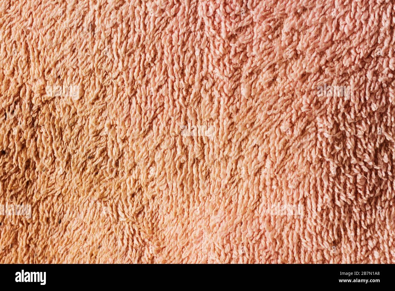 Texture peu profonde de la fermeture de tissu marron clair. Banque D'Images