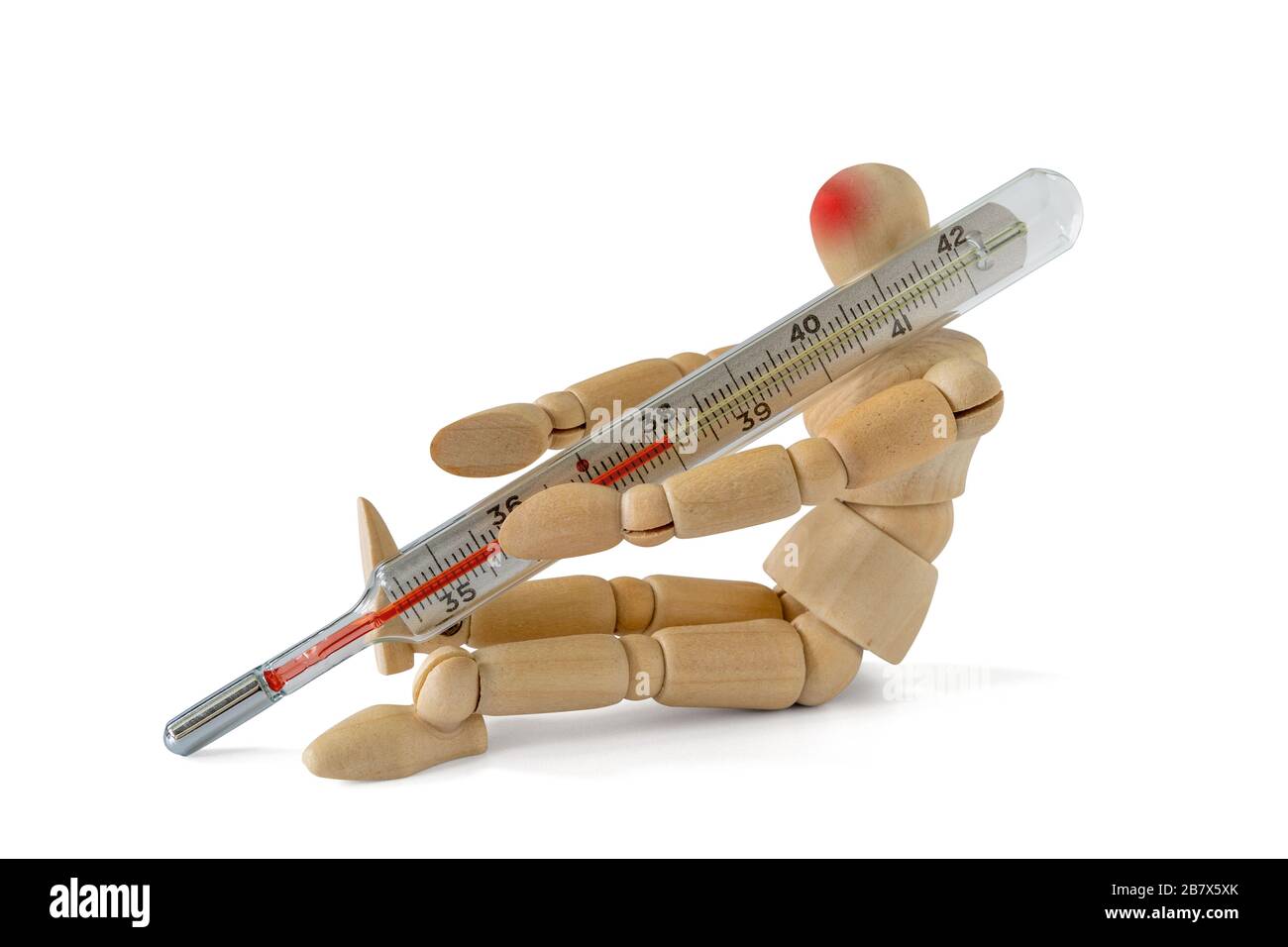Thermomètre homme en bois indiquant une température élevée. Concept de saison du froid, du virus et de la grippe. Banque D'Images