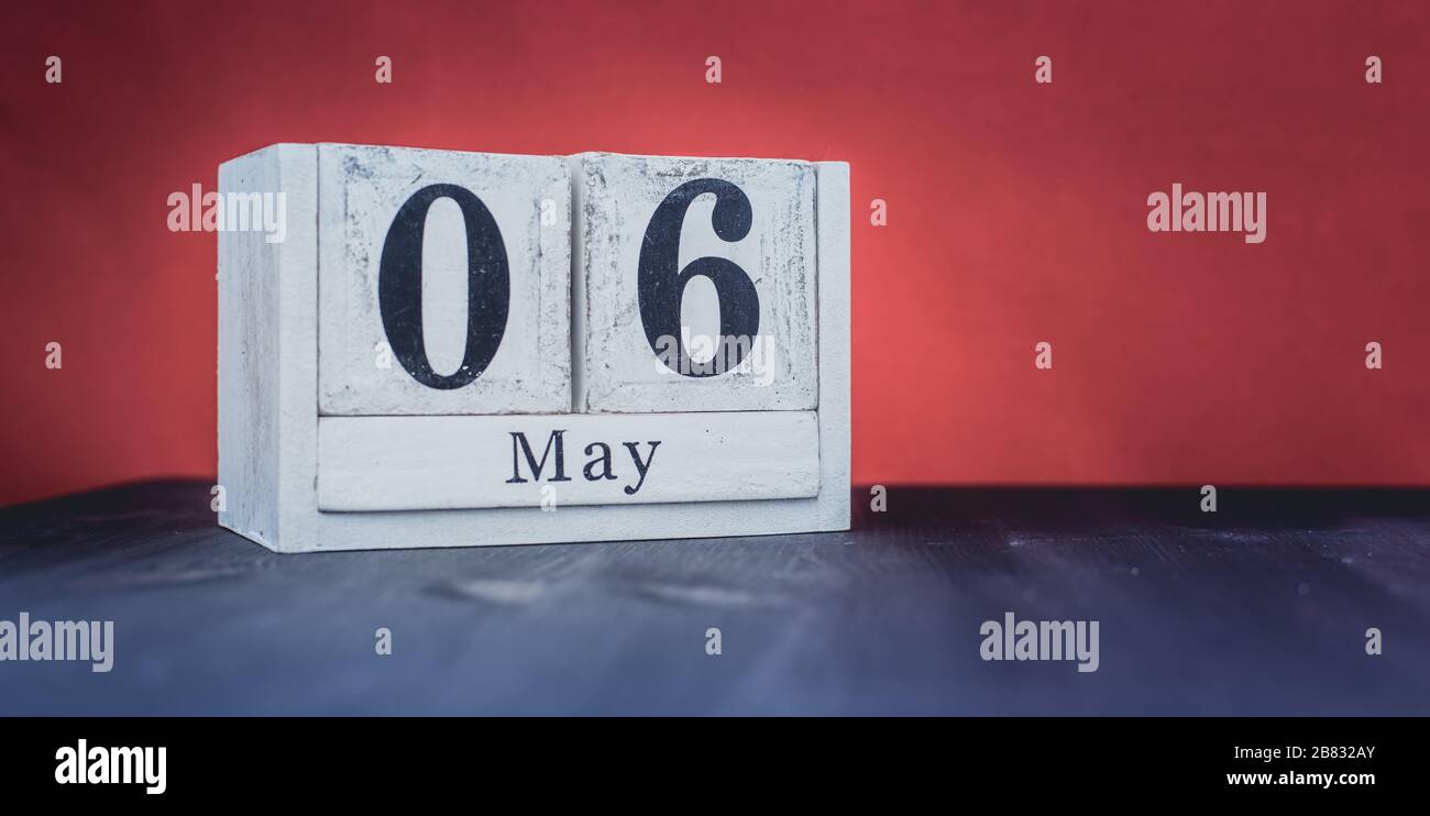 6 mai - 6 mai - beau printemps - la saison la plus positive de l'année - blocs blancs avec les symboles de date et mai Photo Stock - Alamy