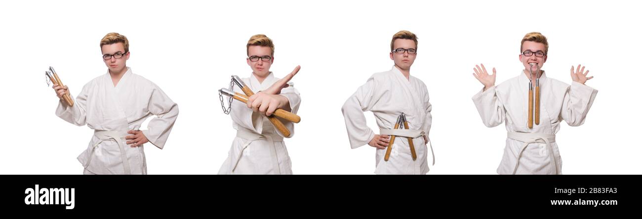 Le funny karate fighter avec nunchucks on white Banque D'Images